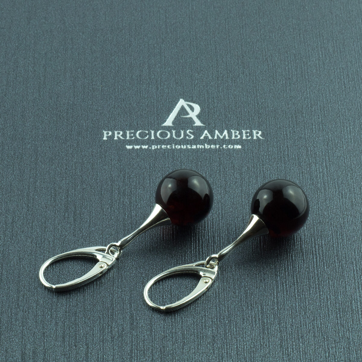 Cherry Amber Sphere Earrings - Image 1