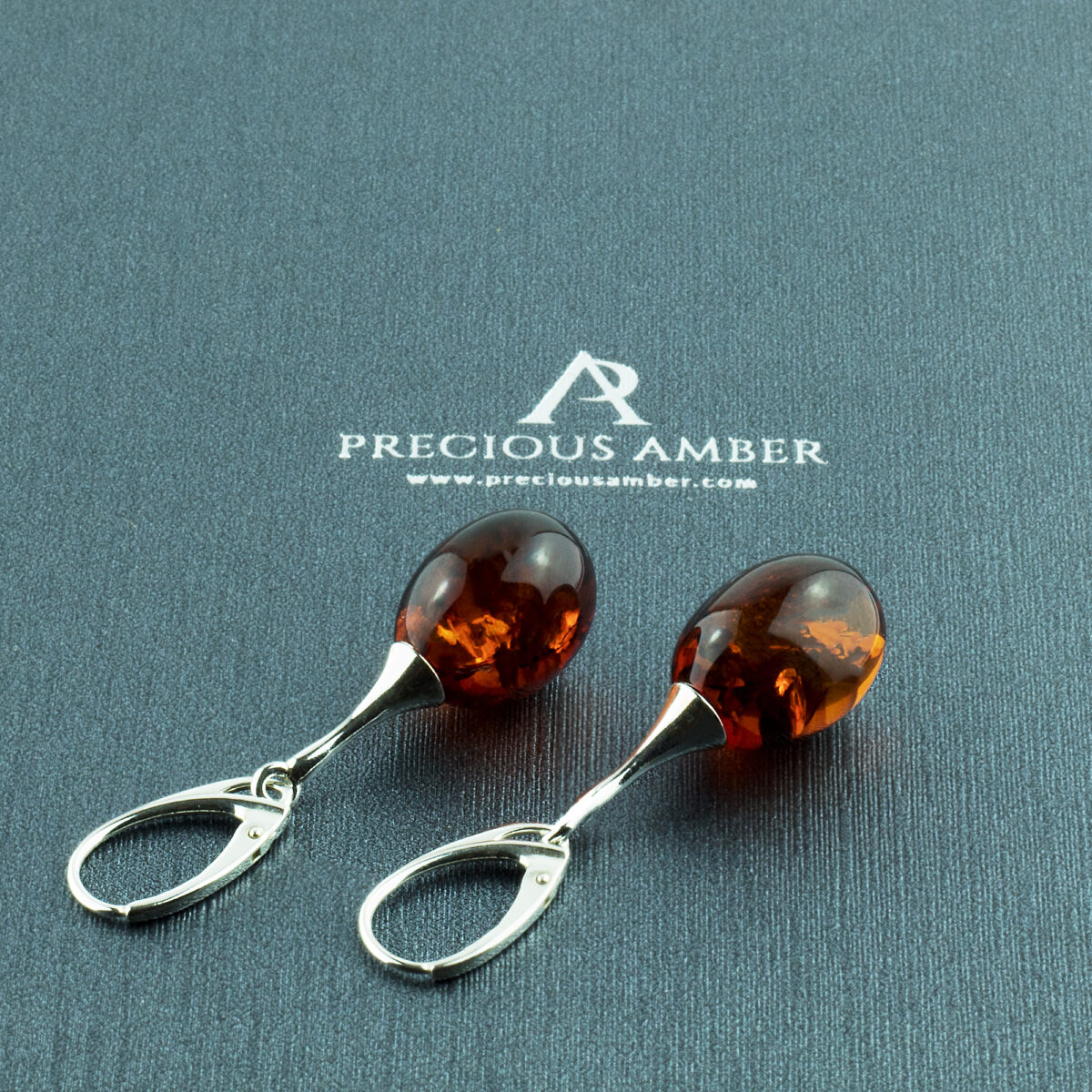 Cognac-Baltic-Amber-Silver-Olive-Long-Dangle-Gemstone-Drop-Dangle-Earrings-for-Women-Lever-Back Honey Amber Olive Earrings - Image 1