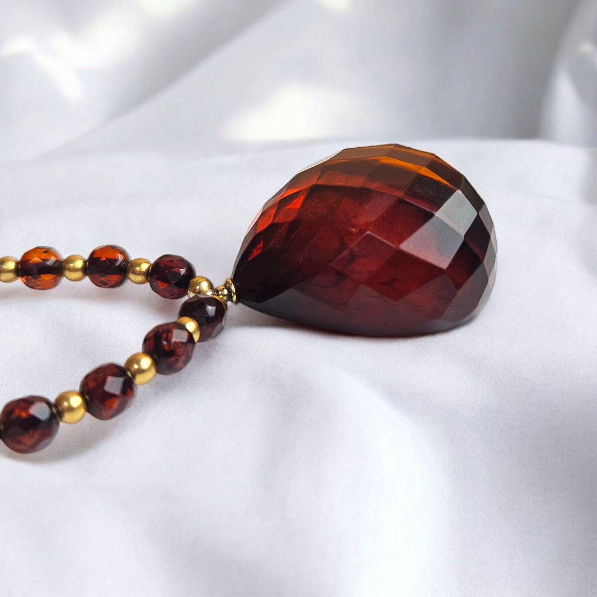 Luxurious Faceted Cherry Amber Pendant Necklace - Image 6