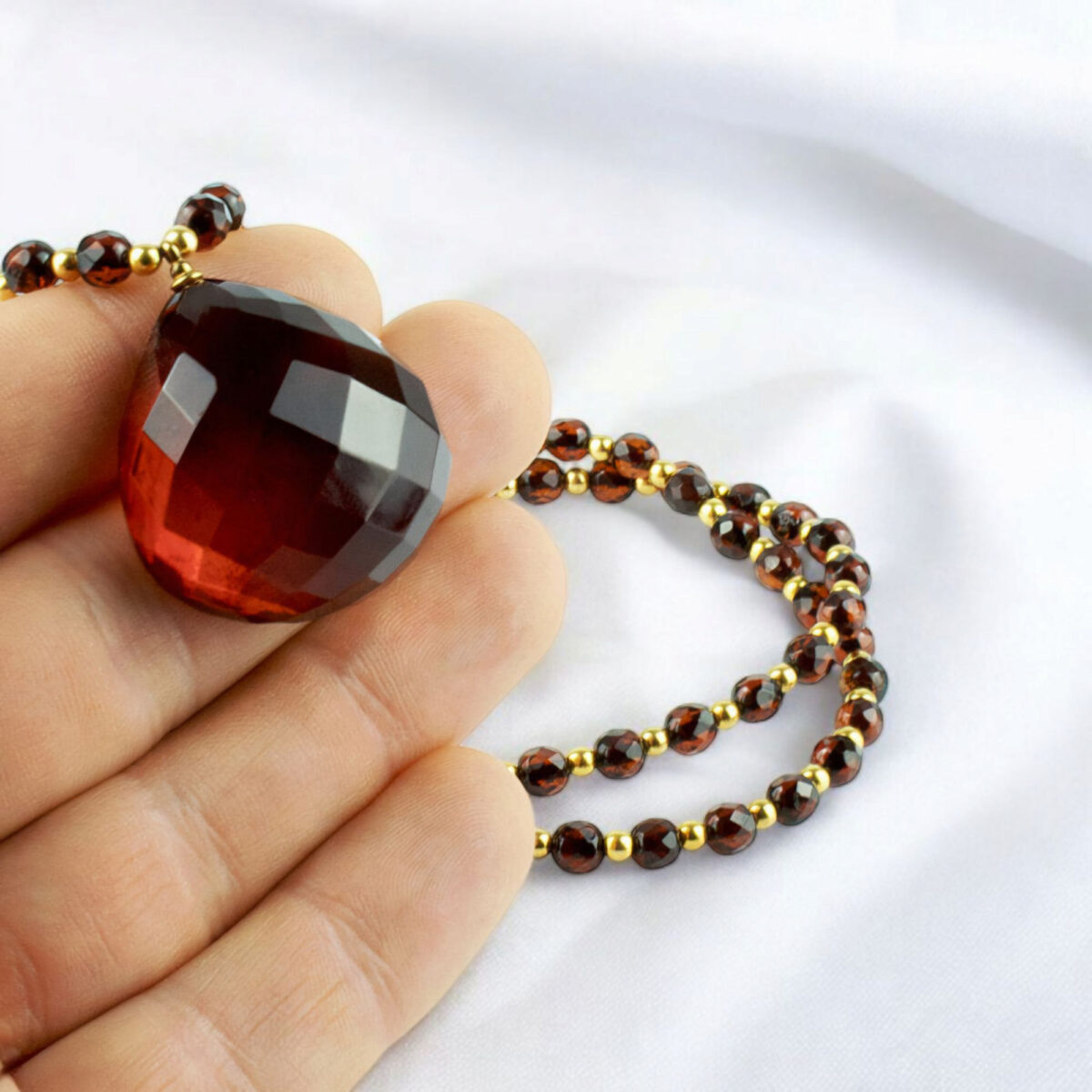 Luxurious Faceted Cherry Amber Pendant Necklace - Image 8