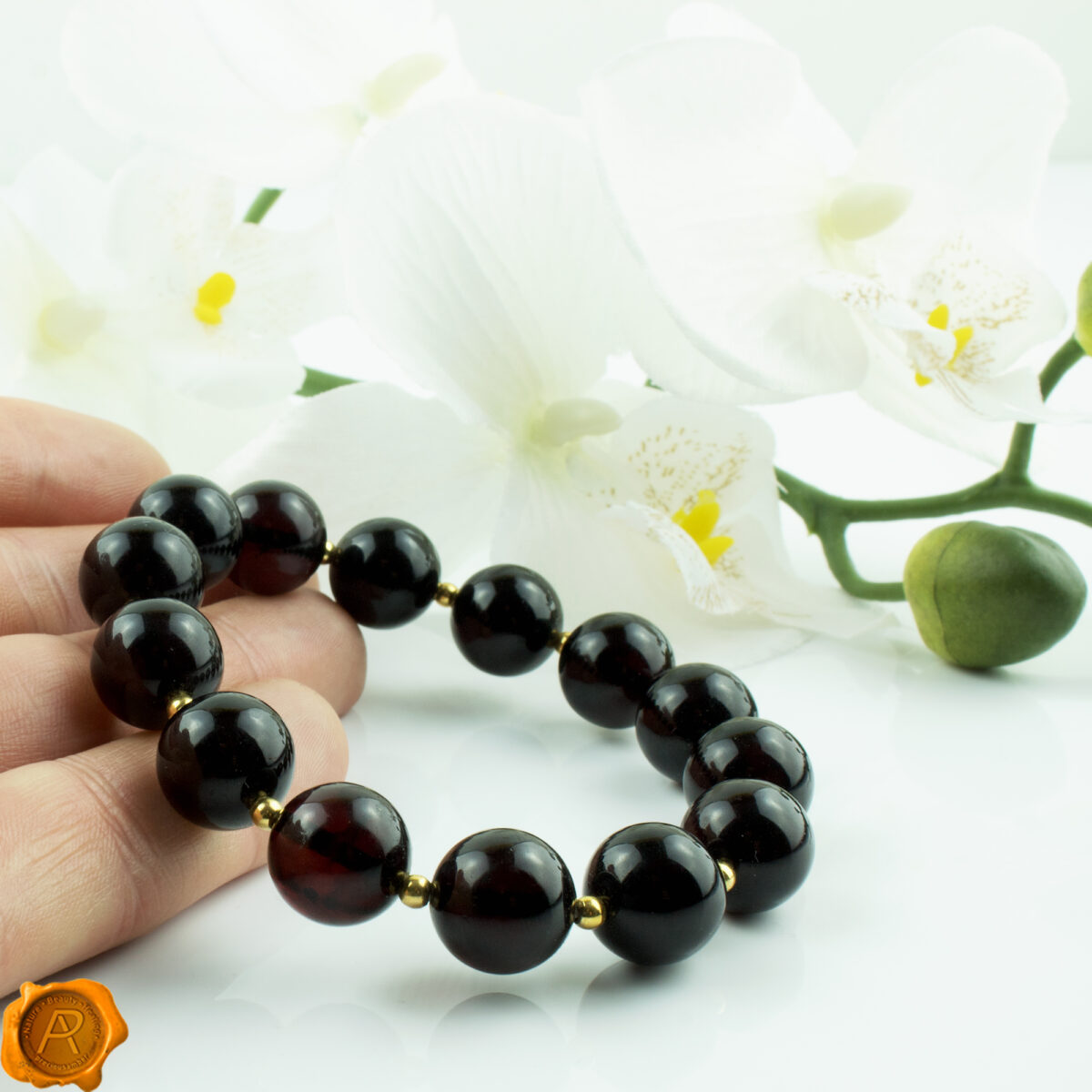 Luxury-Cherry-Baltic-Amber-Bracelet-for-Women-Gold-Plated-Spacers-14mm-Beads Cherry Amber Gold Bracelet - Image 2