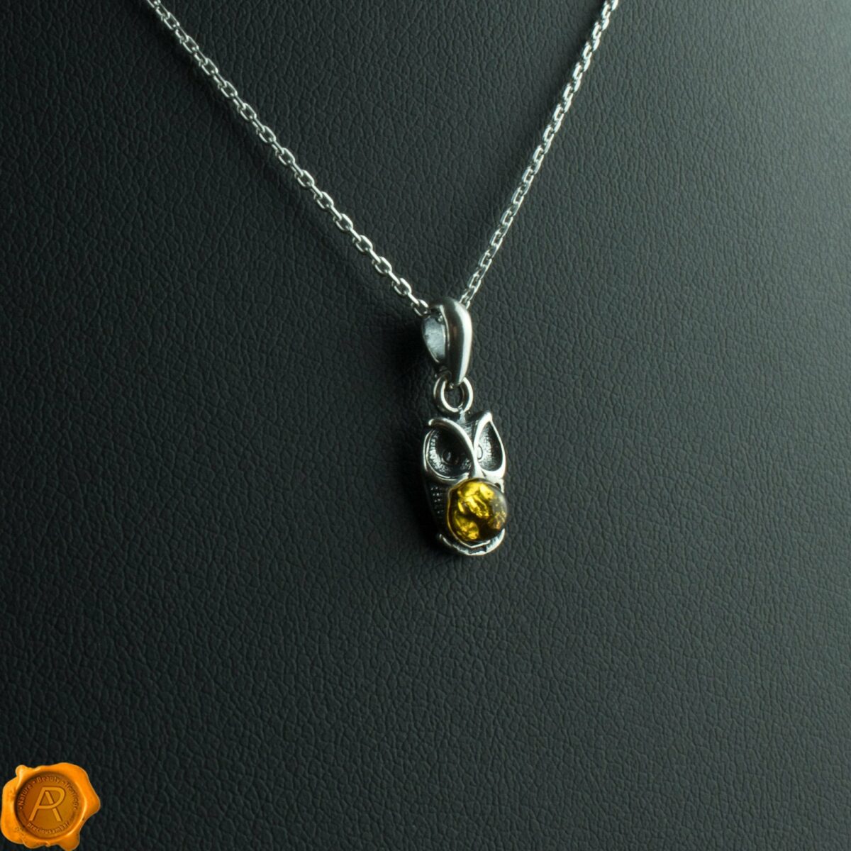 Green Amber Owl Pendant - Image 1