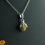 Dainty Ladybird Amber Pendant