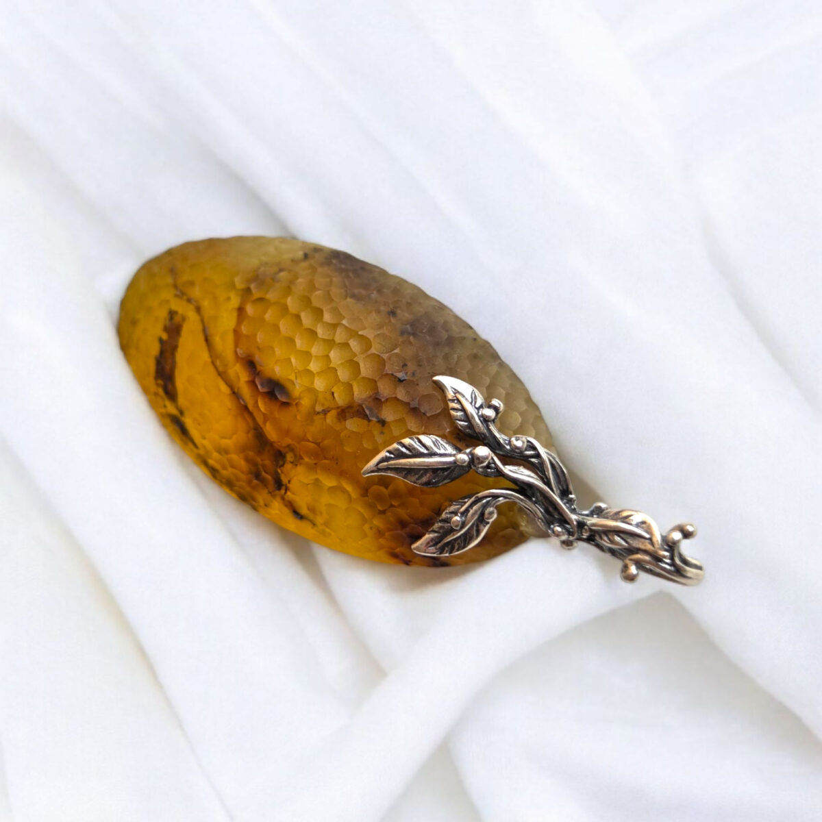 Luxurious Carved Amber Celestial Pendant - Image 5