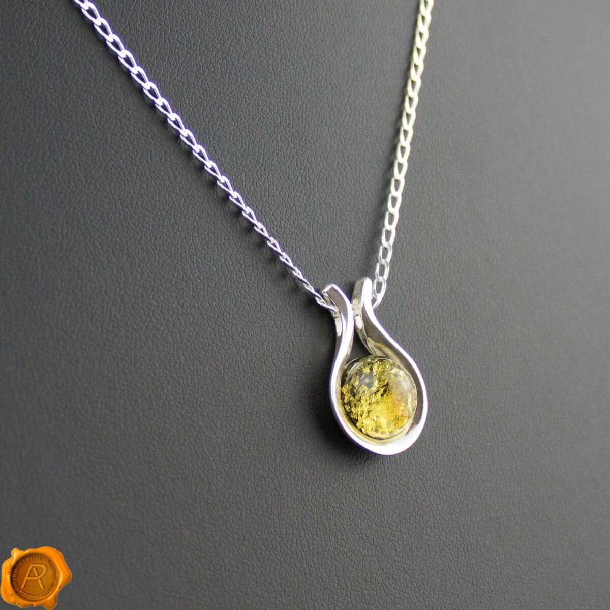 Green Amber Horseshoe Pendant Green Amber Horseshoe Pendant - Image 1