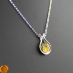 Green Amber Horseshoe Pendant