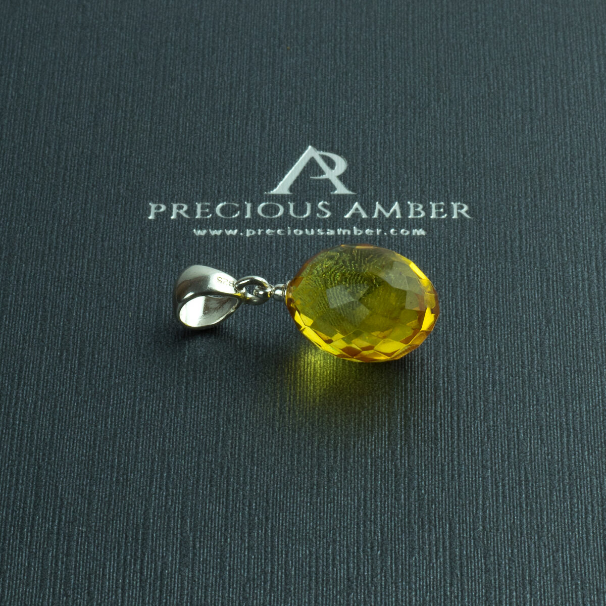 Faceted-Cognac-Baltic-Amber-Olive-Short-Dangle-Lever-Back-Gemstone-Silver-Earrings Faceted Amber Olive Pendant - Image 4