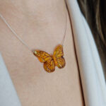 Carved Amber Butterfly Pendant Necklace - Image 2