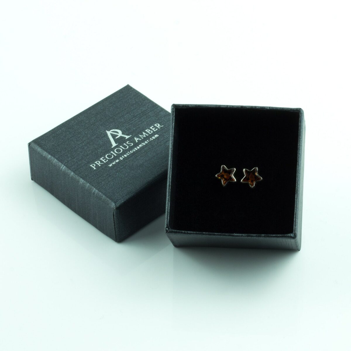 Silver Star Amber Studs - Image 2