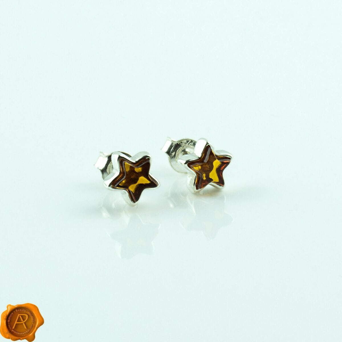 Silver Star Amber Studs - Image 1