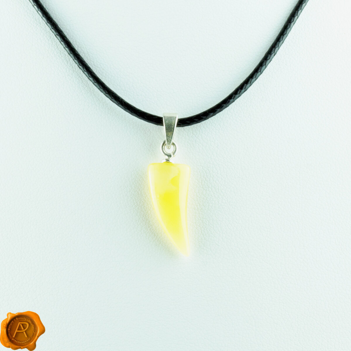 Tiger Tooth Amber Pendant - Image 1