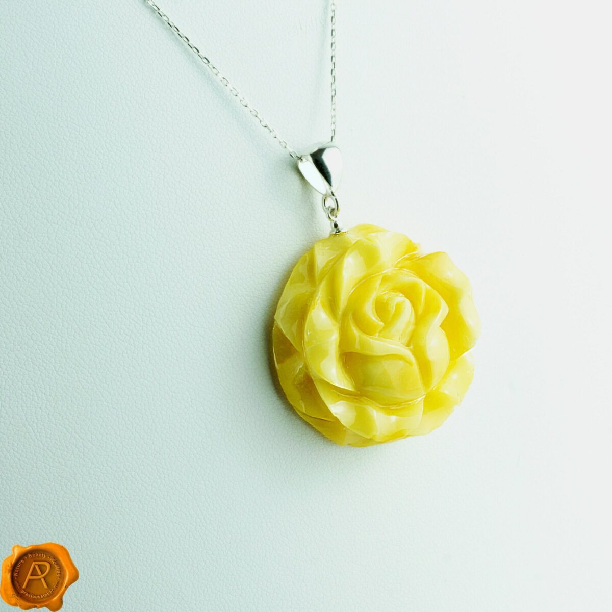 Handcarved Amber Rose Pendant - Image 1