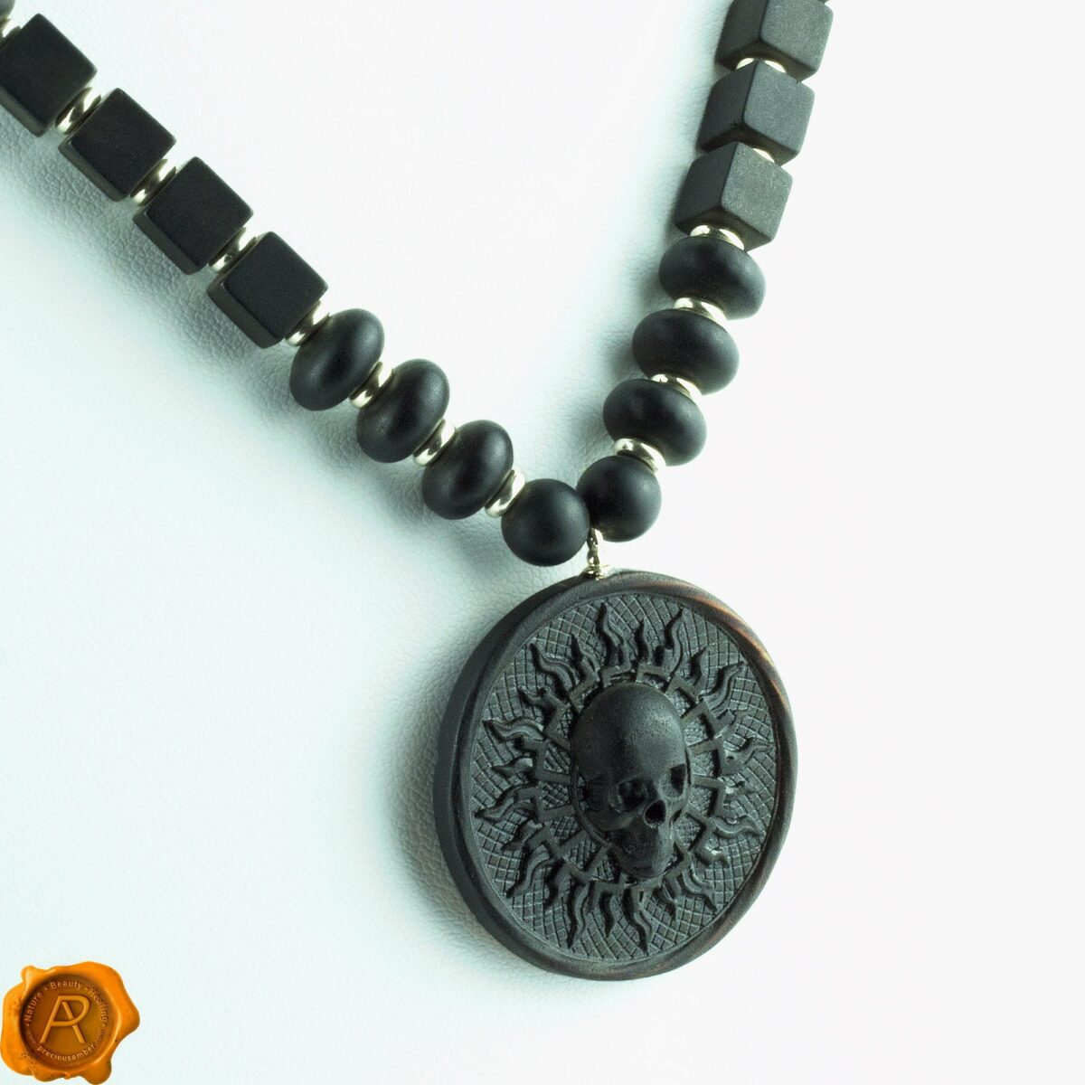 Handcarved Amber Skull Amulet Necklace - Image 1