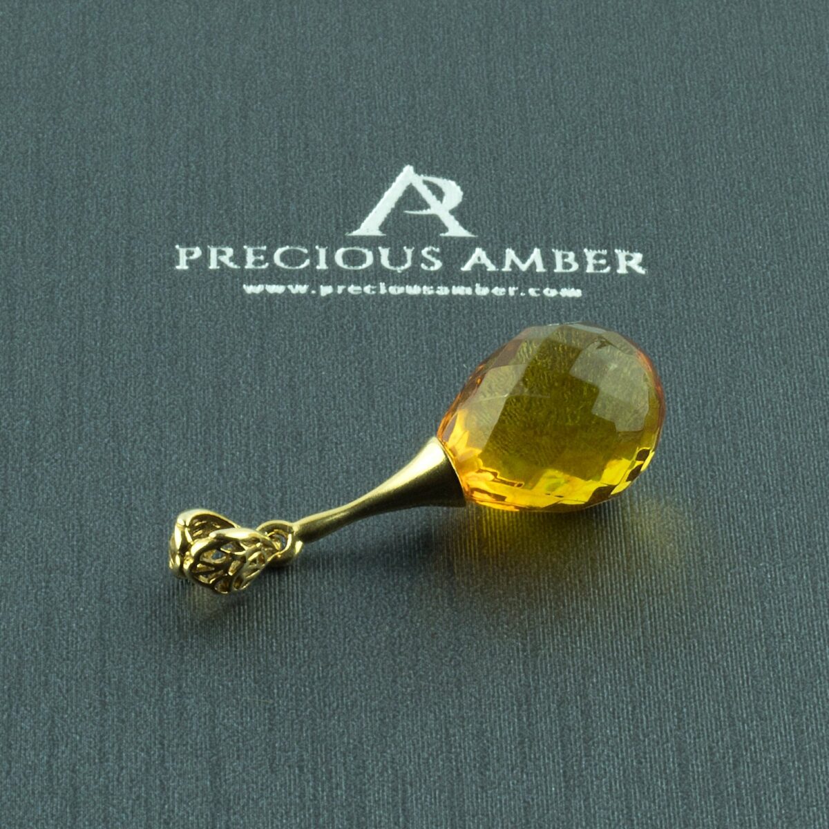 Luxurious Faceted Amber Gold Pendant - Image 1