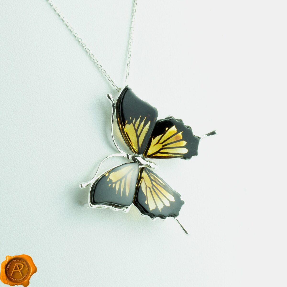 Carved Amber Butterfly Pendant - Image 3