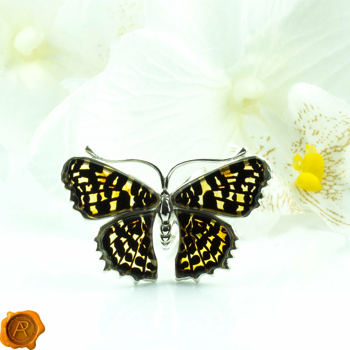 Adjustable Carved Amber Butterfly Ring - Image 1