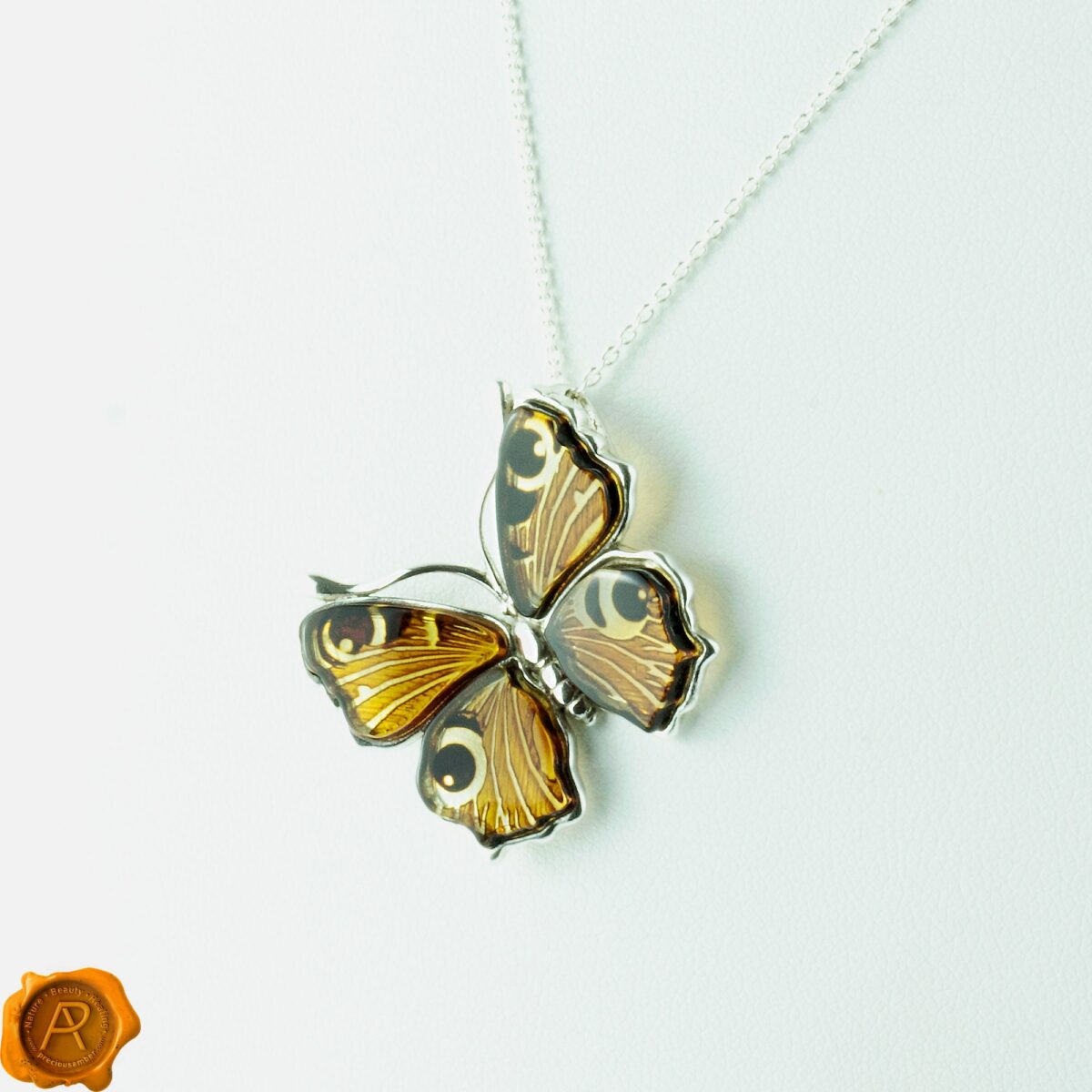 Carved Amber Peacock Butterfly Pendant - Image 7