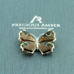 Carved Amber Peacock Butterfly Pendant