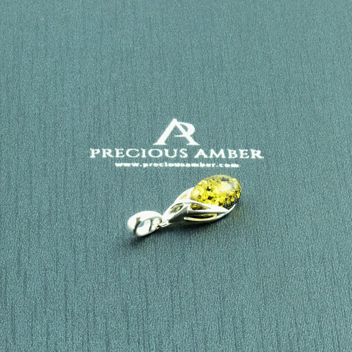 Celtic Green Amber Silver Charm - Image 1