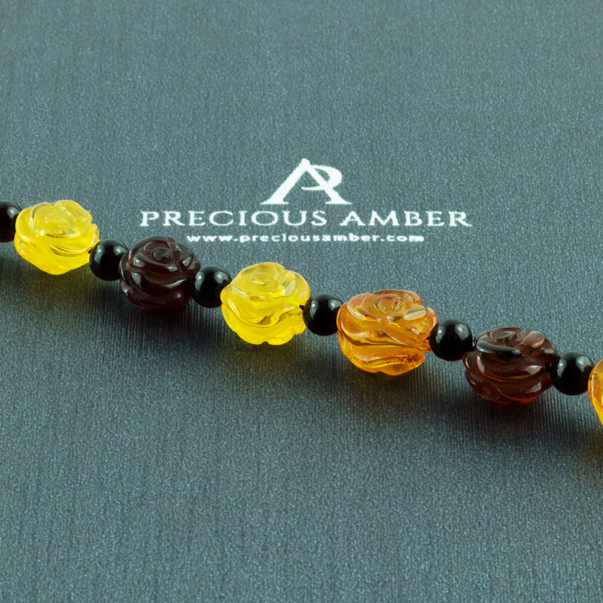 Carved Amber Rose Necklace - Image 2
