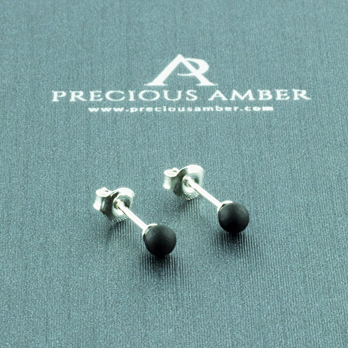 Minimalist Black Amber Stud Earrings - Image 1