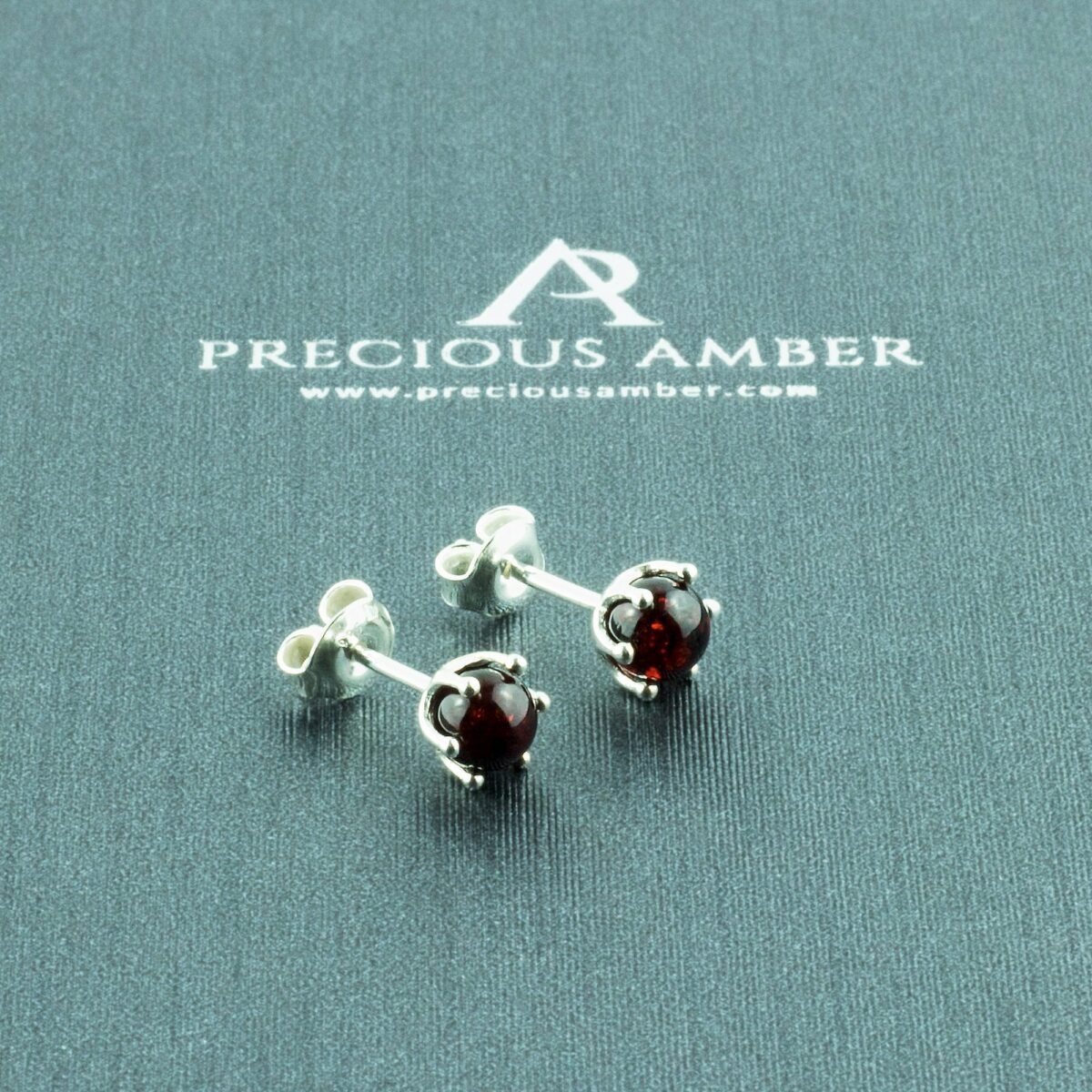 Dainty Cherry Amber Stud Earrings - Image 1