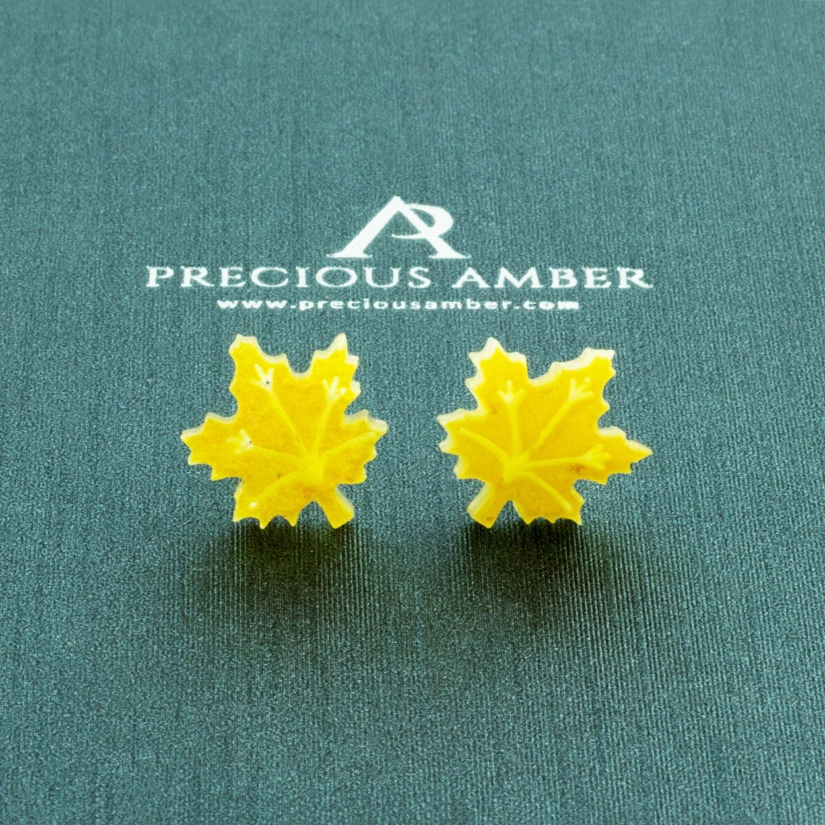 Carved Amber Leaf Stud Earrings - Image 1