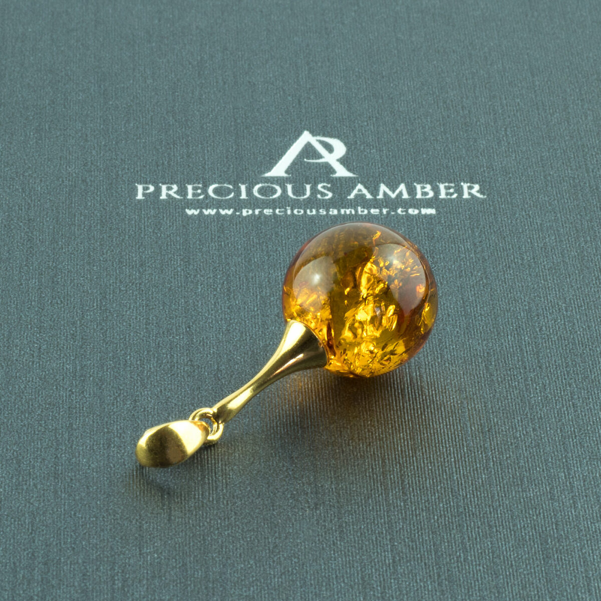 Classic Amber Sphere Gold Pendant - Image 1