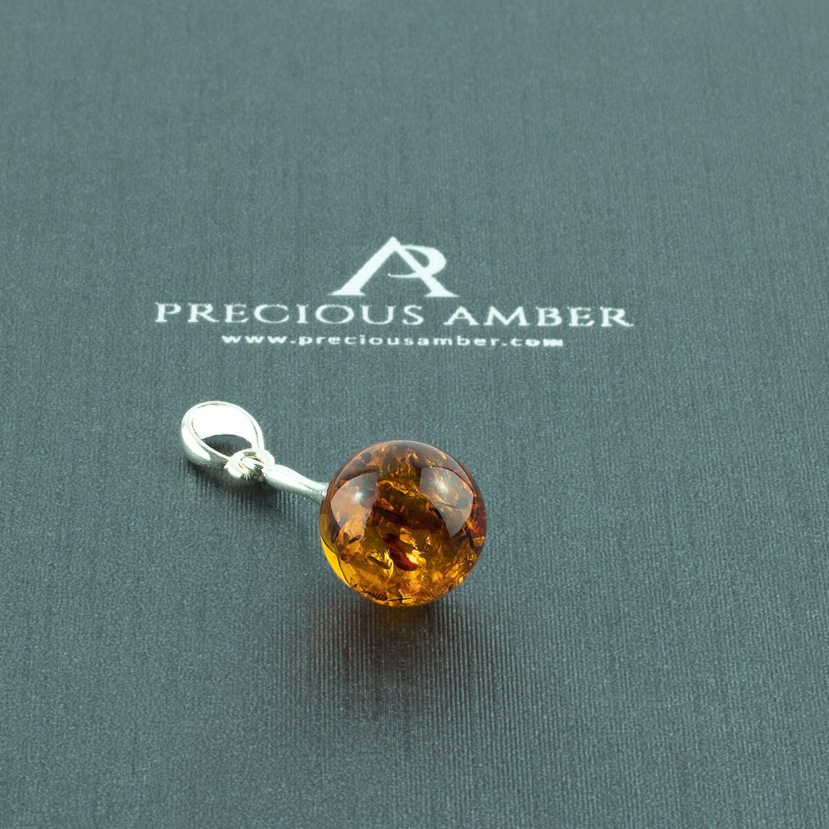 Classic Amber Silver Sphere Pendant - Image 1
