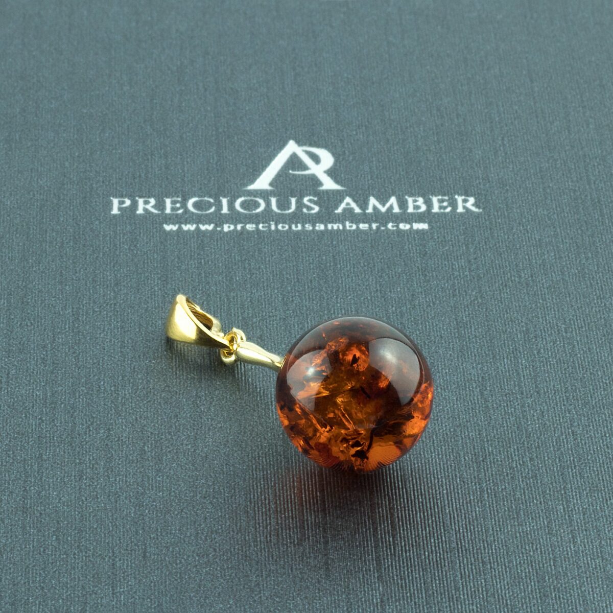 Classic Amber Sphere Gold Pendant - Image 1