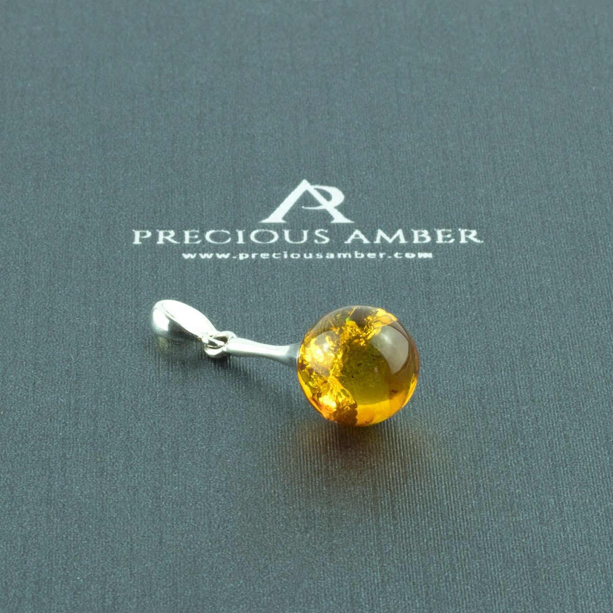 Classic Honey Amber Sphere Pendant - Image 1