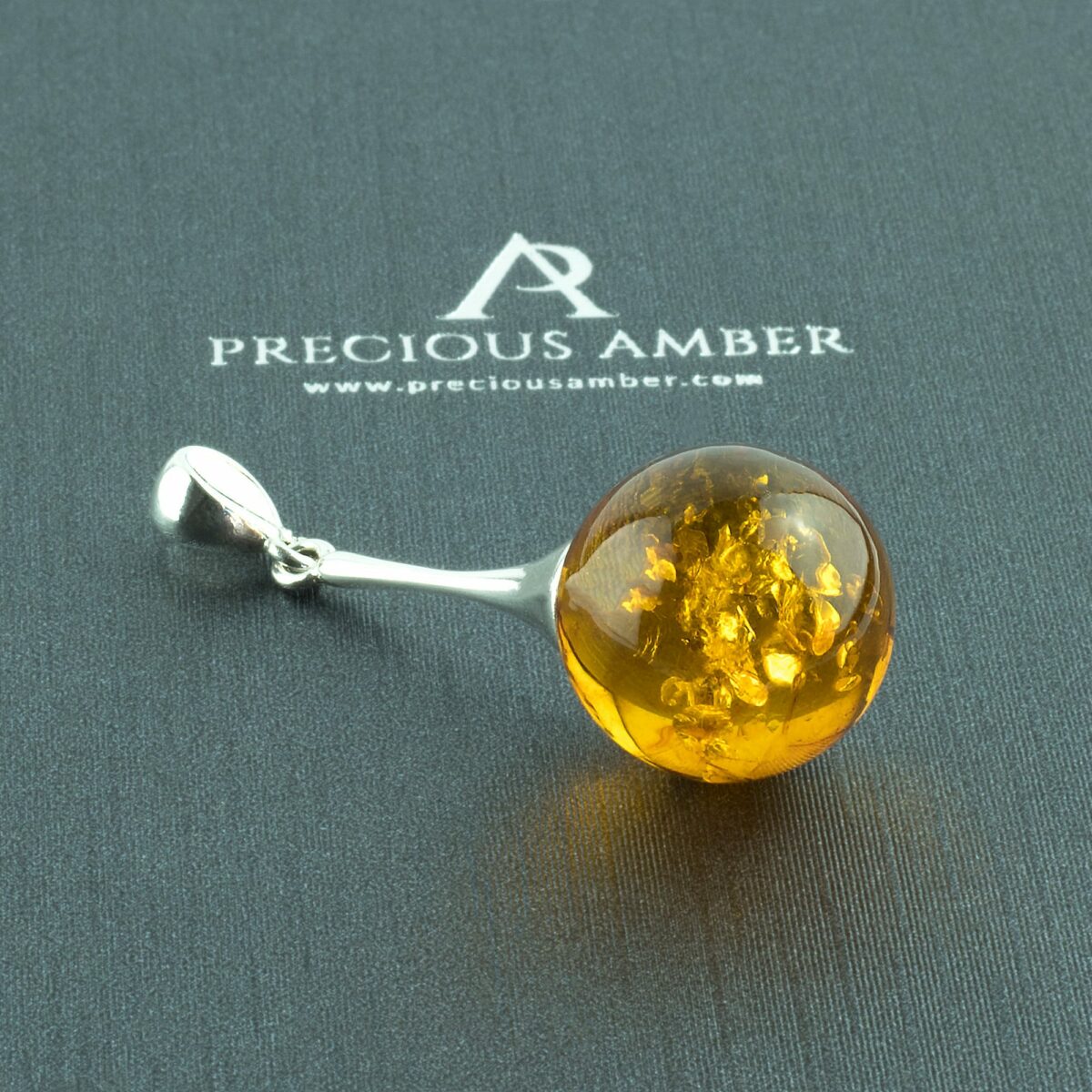 Classic Amber Silver Sphere Pendant - Image 1