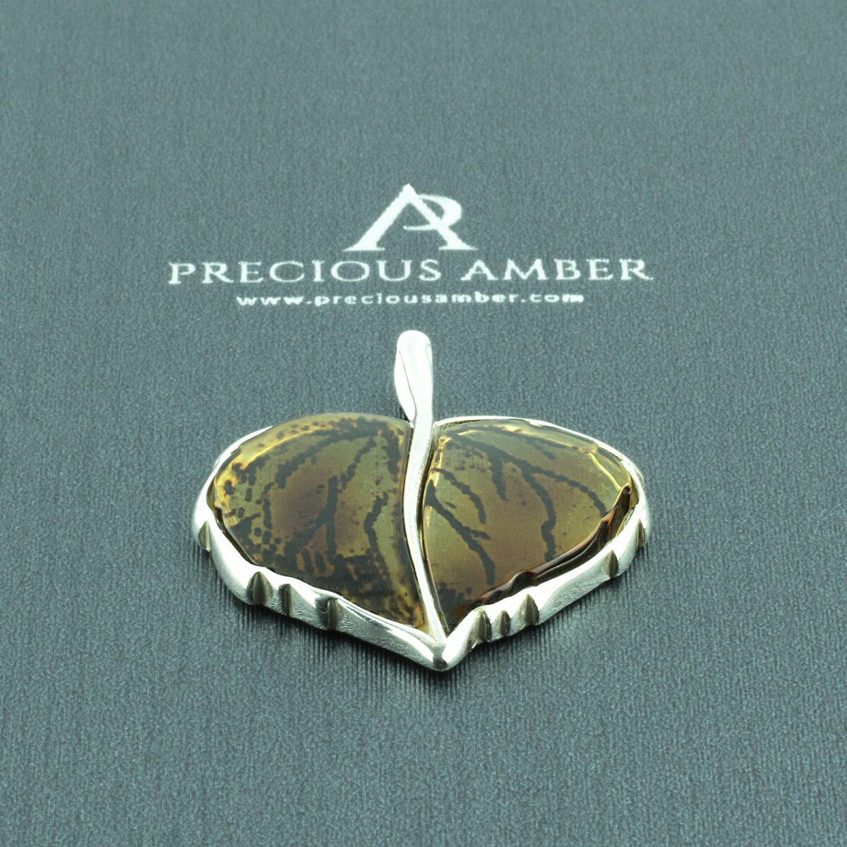 Carved Amber Silver Leaf Pendant - Image 1