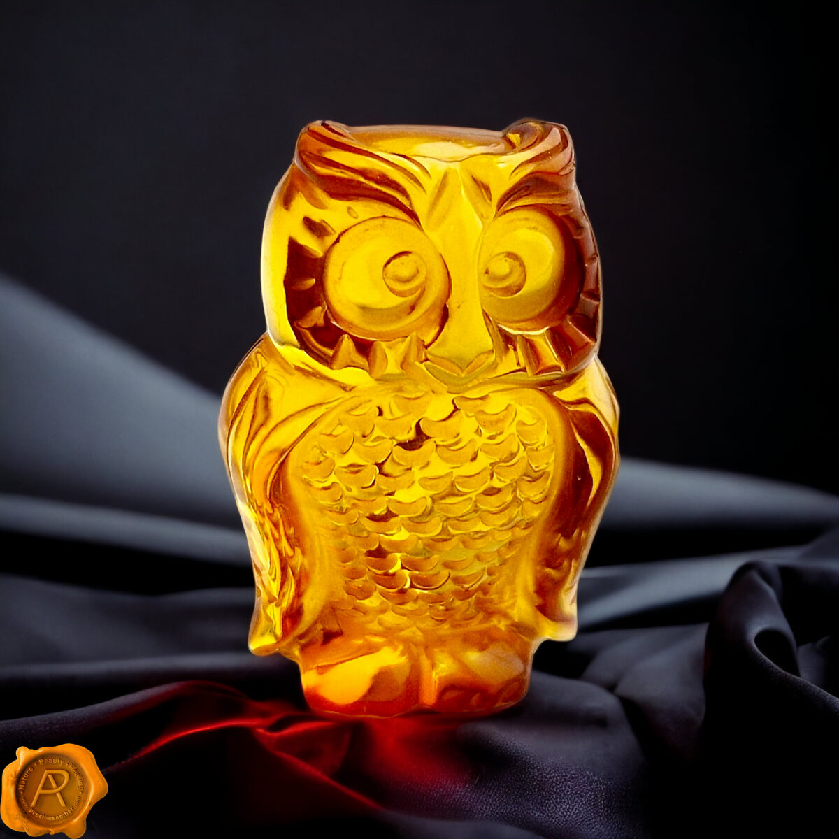 Carved Honey Amber Owl Figurine - Image 1