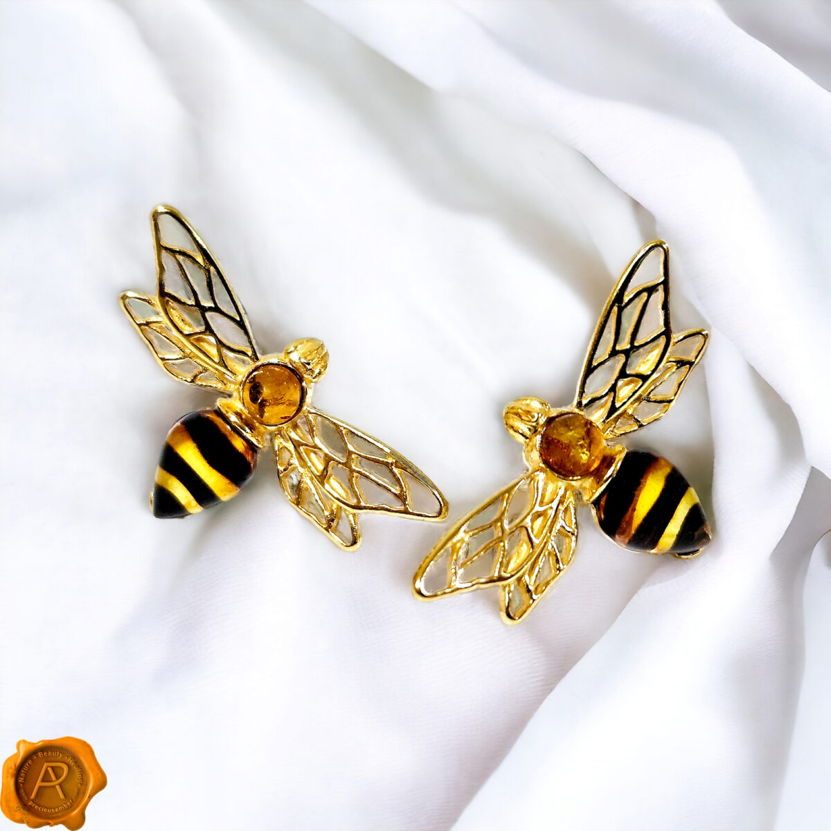 Carved Amber Bee Stud Earrings - Image 1