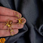Carved Amber Gold Spider Earrings - Image 3