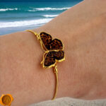 Carved Amber Gold Butterfly Tie Bracelet - Image 2