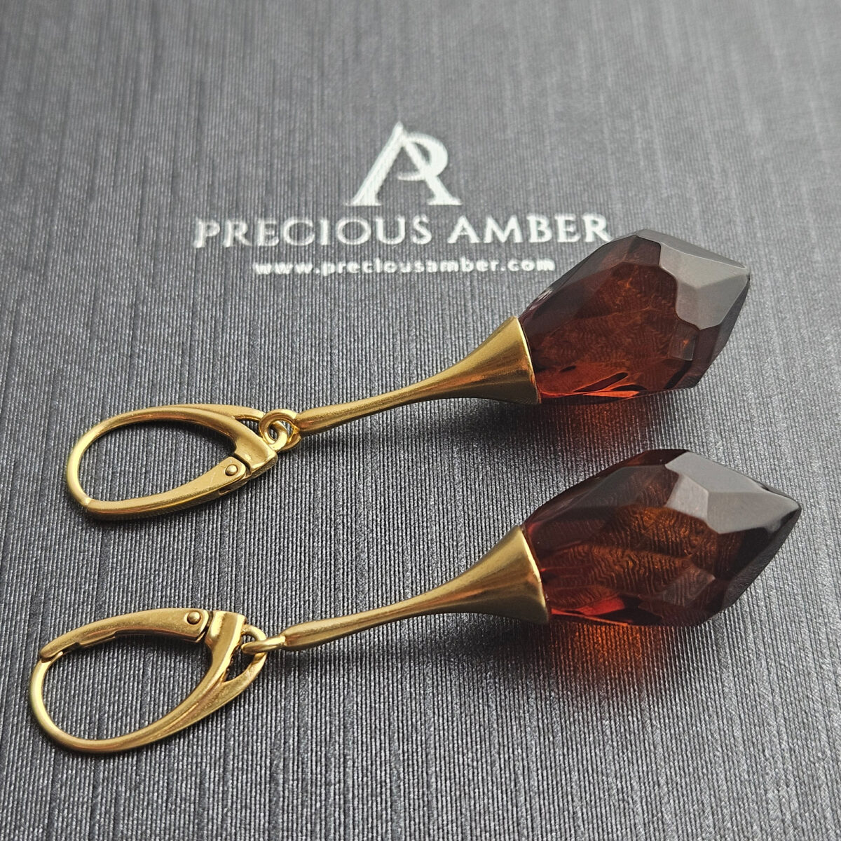 Luxurious Faceted Cherry Amber Earrings - Image 1