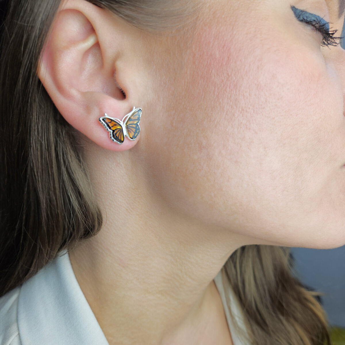 Carved Amber Butterfly Silver Stud Earrings - Image 2