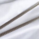 Interlocking Carved Amber Teardrop Pendant - Image 9