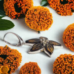 Carved Amber Flower Silver Earrings - Image 2
