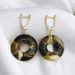 Celestial Carved Amber Amulet Earrings - Image 3