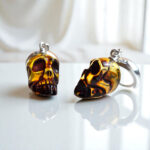 Carved Amber Skull Earrings - Image 4